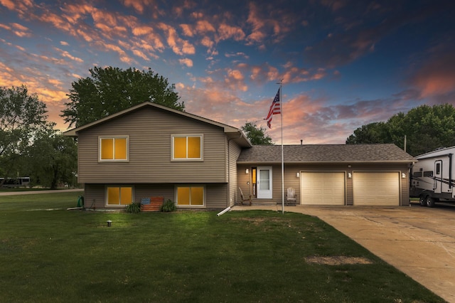 18029 Krypton St NW, Ramsey, MN 55303 - tri-level home featuring a garage, a front yard, and concrete driveway