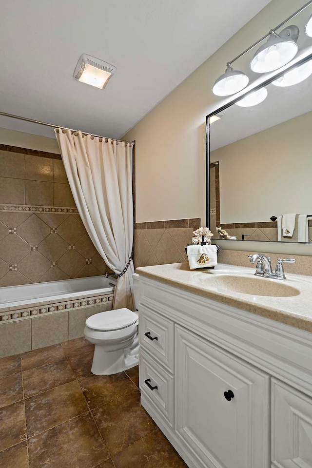 21570 France Blvd, Credit River Twp, MN 55044 - full bath featuring toilet, tiled shower / bath, vanity, and tile walls