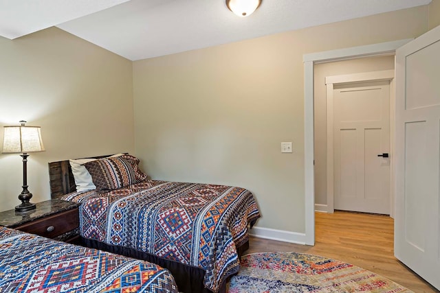 21570 France Blvd, Credit River Twp, MN 55044 - bedroom featuring wood finished floors and baseboards