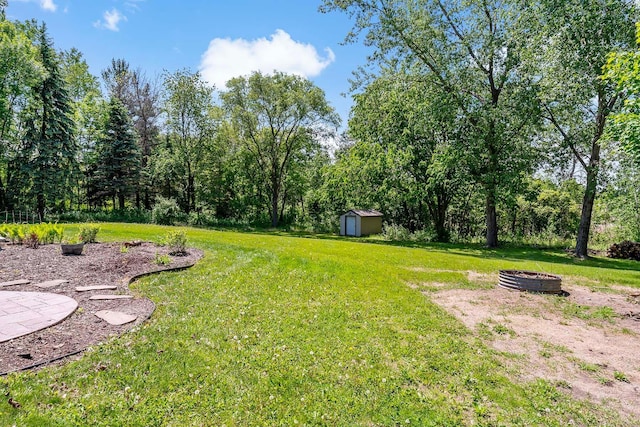 21570 France Blvd, Credit River Twp, MN 55044 - view of green lawn featuring an outdoor fire pit