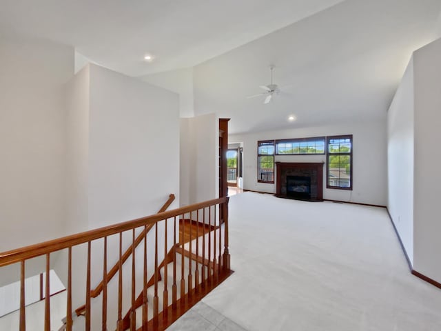 1101 Golfers Ct SE, Rochester, MN 55904 - hallway featuring an upstairs landing, lofted ceiling, carpet floors, and recessed lighting