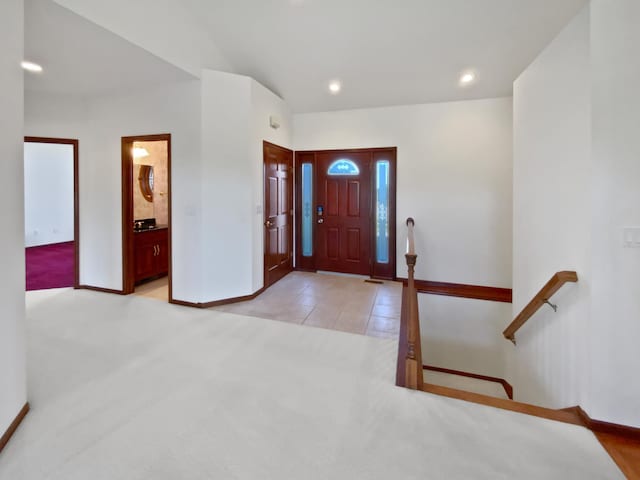 1101 Golfers Ct SE, Rochester, MN 55904 - foyer entrance with light colored carpet, baseboards, and recessed lighting