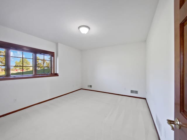 1101 Golfers Ct SE, Rochester, MN 55904 - unfurnished room with light colored carpet and baseboards