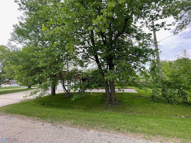 103 4th St S, Fairmount, ND 58030 - obstructed view of property with concrete driveway and a front yard