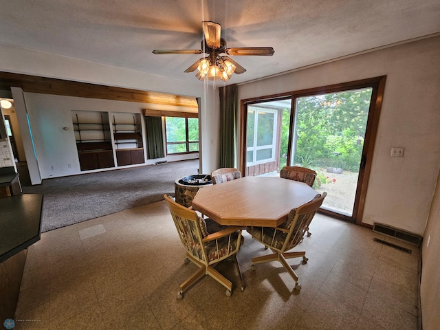 103 4th St S, Fairmount, ND 58030 - dining room with tile patterned floors, plenty of natural light, ceiling fan, and baseboards