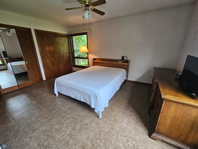 103 4th St S, Fairmount, ND 58030 - bedroom with multiple closets and ceiling fan