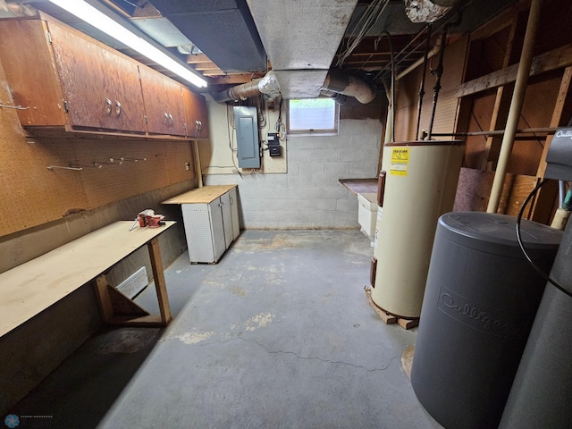 103 4th St S, Fairmount, ND 58030 - basement featuring water heater, a workshop area, and electric panel