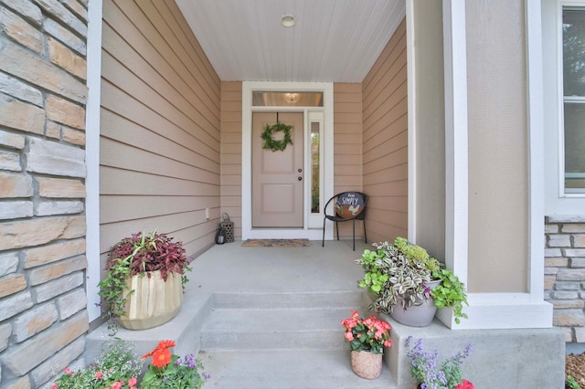 23904 Summer Haven Ln, Nisswa, MN 56468 - view of exterior entry featuring stone siding