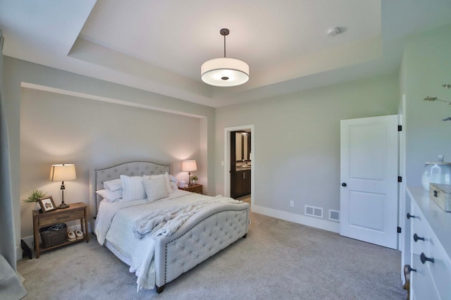23904 Summer Haven Ln, Nisswa, MN 56468 - bedroom featuring light carpet, a tray ceiling, and baseboards