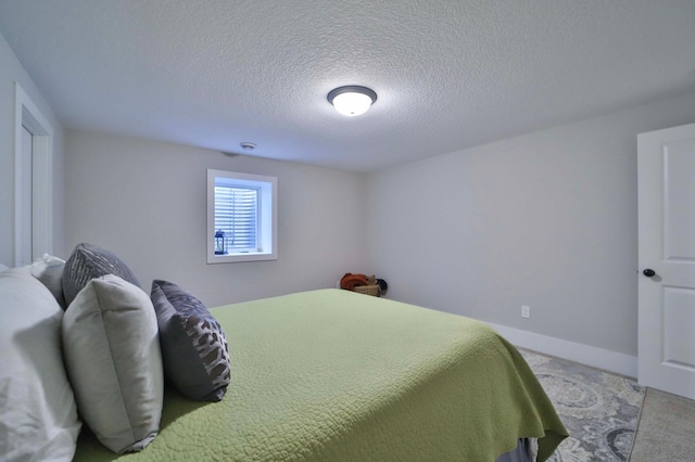 23904 Summer Haven Ln, Nisswa, MN 56468 - carpeted bedroom with a textured ceiling