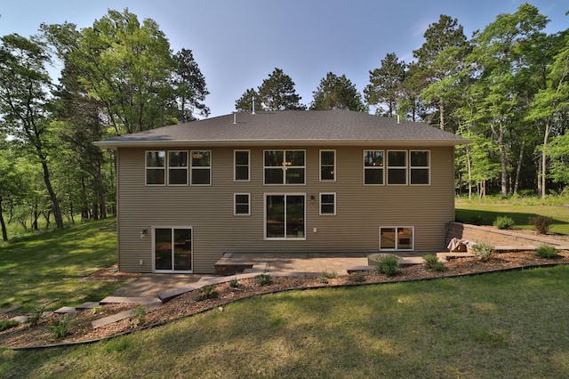 23904 Summer Haven Ln, Nisswa, MN 56468 - back of property featuring a patio and a lawn