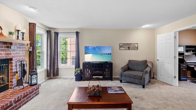 8548 139th St, Savage, MN 55378 - carpeted living room featuring a textured ceiling, a fireplace, and baseboards