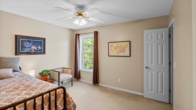 8548 139th St, Savage, MN 55378 - bedroom featuring light carpet, baseboards, a textured ceiling, and ceiling fan