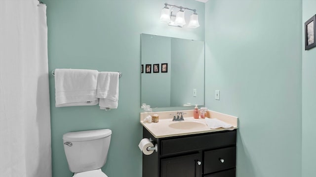 8548 139th St, Savage, MN 55378 - bathroom featuring vanity, toilet, and a shower with curtain