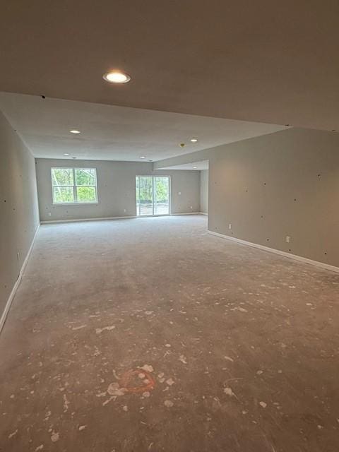 10051 Mulberry Ln, Corcoran, MN 55374 - spare room featuring baseboards and recessed lighting