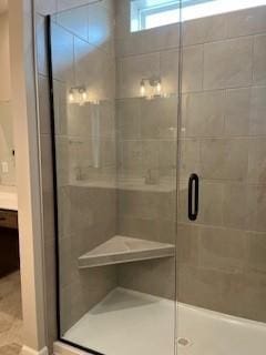 10051 Mulberry Ln, Corcoran, MN 55374 - bathroom featuring vanity and a stall shower