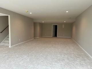 10051 Mulberry Ln, Corcoran, MN 55374 - finished basement featuring baseboards, recessed lighting, and carpet floors