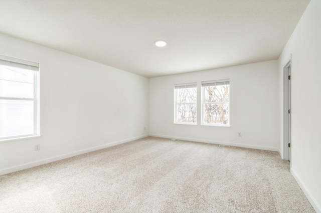 22615 Isla Way, Rogers, MN 55374 - unfurnished room with light colored carpet and baseboards