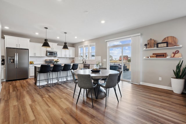 5282 Randolph Ave NE, Otsego, MN 55374 - dining space featuring recessed lighting, light wood-type flooring, and baseboards