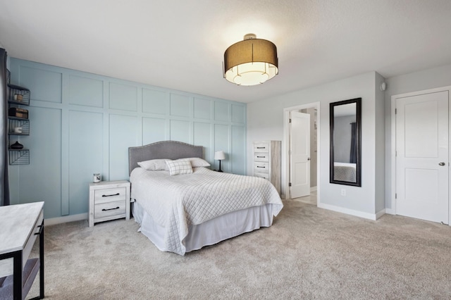5282 Randolph Ave NE, Otsego, MN 55374 - bedroom with light colored carpet, a decorative wall, and baseboards