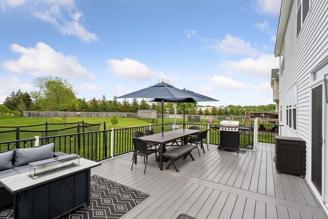 5282 Randolph Ave NE, Otsego, MN 55374 - deck featuring outdoor dining area, an outdoor living space with a fire pit, and grilling area