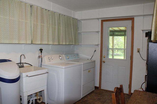 44500 Elmcrest Ave, Fish Lake Twp, MN 55032 - laundry room featuring separate washer and dryer and stone finish floors