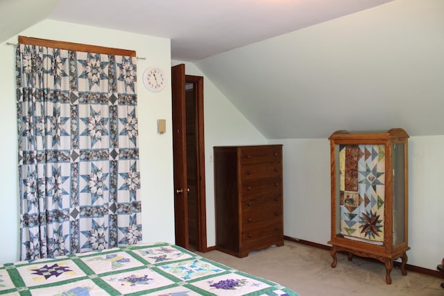 44500 Elmcrest Ave, Fish Lake Twp, MN 55032 - bedroom featuring lofted ceiling, light colored carpet, and baseboards