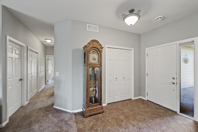 17260 Keystone Ave N, Hugo, MN 55038 - entrance foyer with baseboards and a textured ceiling