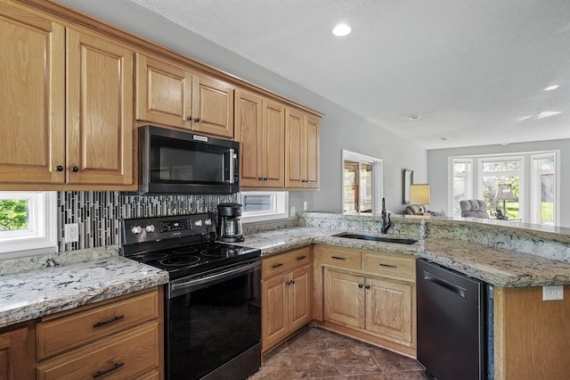 17260 Keystone Ave N, Hugo, MN 55038 - kitchen featuring black range with electric stovetop, dishwasher, a sink, plenty of natural light, and recessed lighting