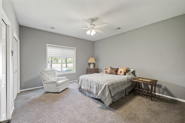 17260 Keystone Ave N, Hugo, MN 55038 - bedroom featuring carpet flooring, baseboards, a textured ceiling, and a ceiling fan