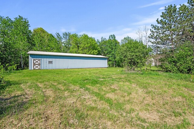 17260 Keystone Ave N, Hugo, MN 55038 - view of grassy yard featuring a pole building and an outbuilding