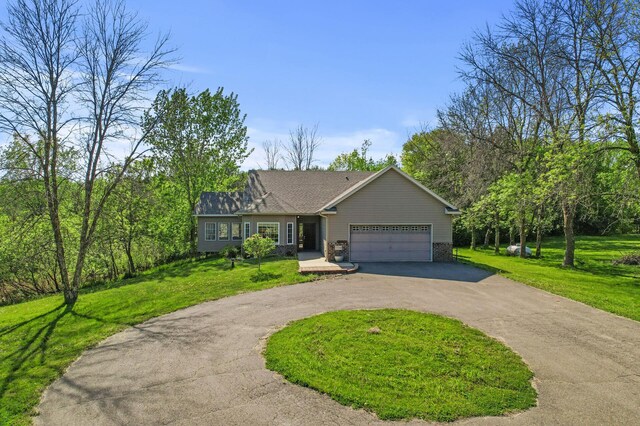 17260 Keystone Ave N, Hugo, MN 55038 - ranch-style house with driveway, a garage, and a front yard