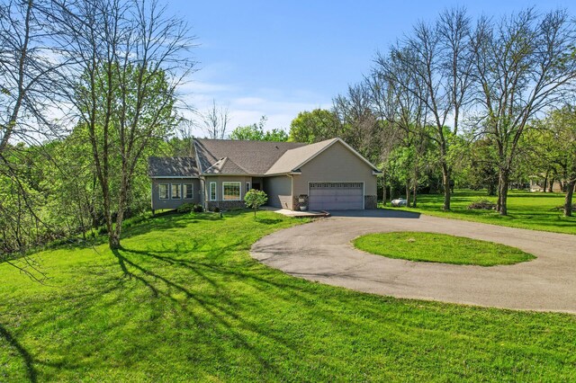 17260 Keystone Ave N, Hugo, MN 55038 - ranch-style home with an attached garage, asphalt driveway, and a front lawn