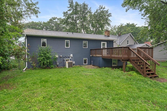 106 1/2 N St, Hudson, WI 54016 - back of house featuring a deck, a chimney, stairway, and central air condition unit