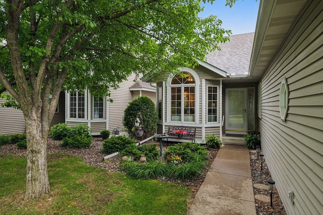11202 Virginia Rd, Bloomington, MN 55438 - property entrance with a shingled roof