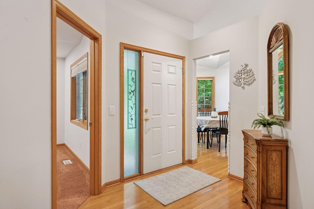 11202 Virginia Rd, Bloomington, MN 55438 - entryway with light wood-type flooring and baseboards