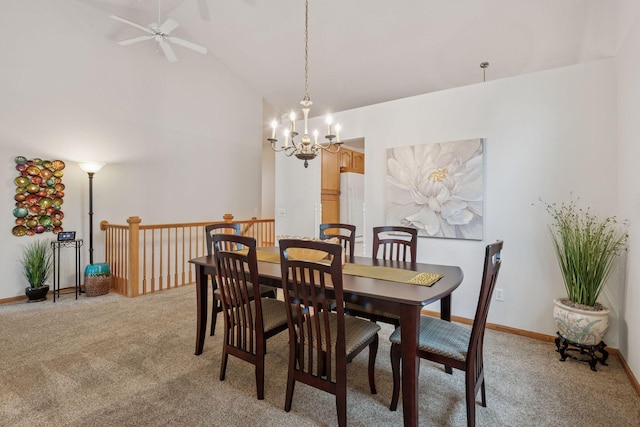 11202 Virginia Rd, Bloomington, MN 55438 - dining area featuring light carpet, a ceiling fan, vaulted ceiling, and a chandelier