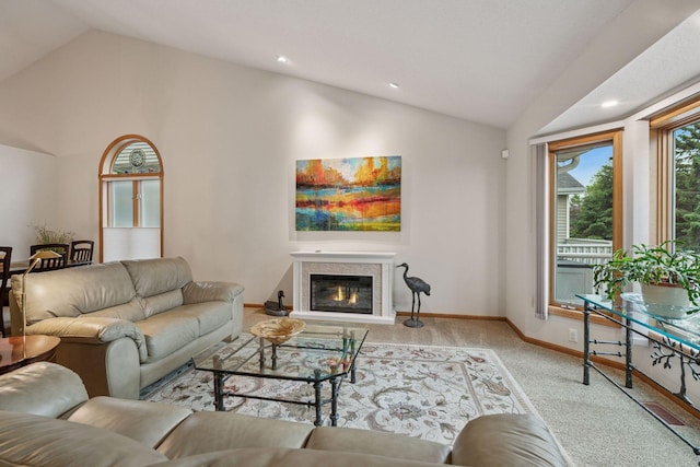 11202 Virginia Rd, Bloomington, MN 55438 - carpeted living area featuring vaulted ceiling, a glass covered fireplace, and recessed lighting