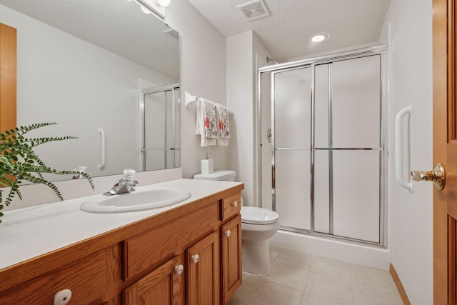 11202 Virginia Rd, Bloomington, MN 55438 - bathroom featuring vanity, a stall shower, a textured ceiling, and tile patterned floors