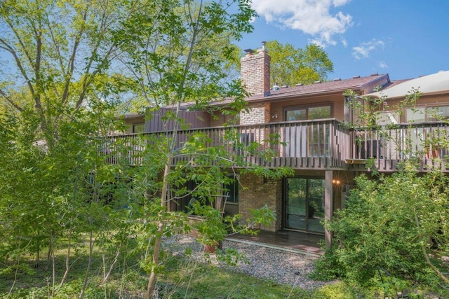 212 Eagle Lake Dr, Maple Grove, MN 55369 - back of house featuring a chimney and a deck