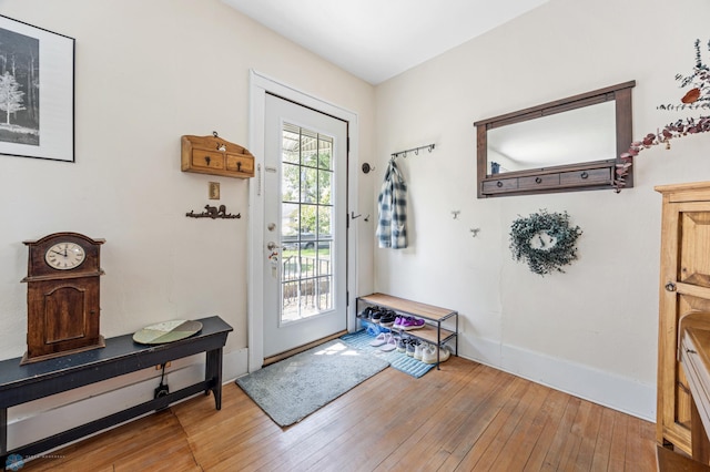 1413 11th Ave S, Fargo, ND 58103 - doorway featuring hardwood / wood-style floors and baseboards