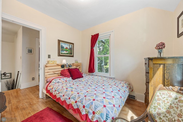 1413 11th Ave S, Fargo, ND 58103 - bedroom featuring hardwood / wood-style floors and baseboards