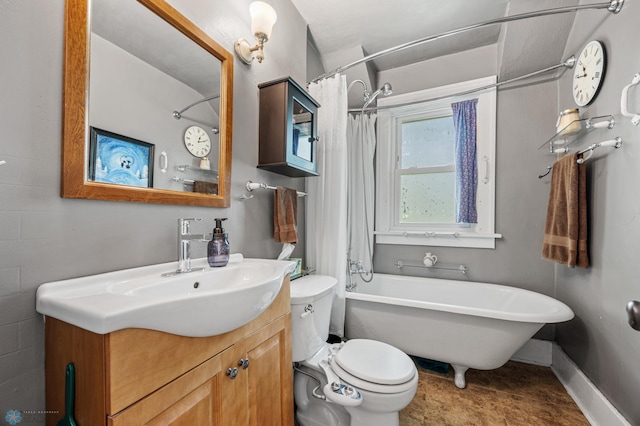 1413 11th Ave S, Fargo, ND 58103 - full bathroom featuring vanity, toilet, and baseboards