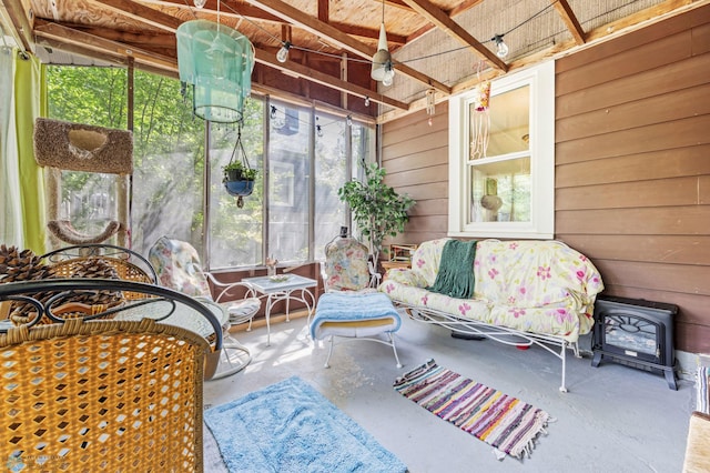 1413 11th Ave S, Fargo, ND 58103 - sunroom / solarium featuring a ceiling fan and a wood stove
