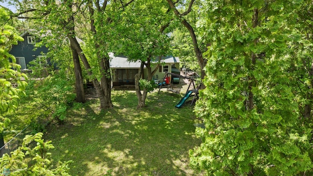 1413 11th Ave S, Fargo, ND 58103 - view of grassy yard featuring a playground