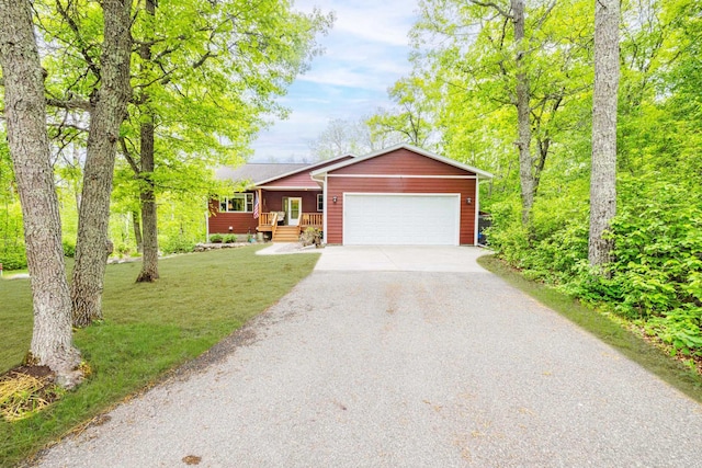 31172 Apache Cir, Breezy Point, MN 56472 - single story home featuring asphalt driveway, a garage, and a front yard