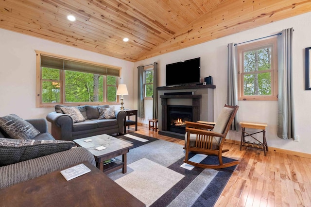 31172 Apache Cir, Breezy Point, MN 56472 - living area with vaulted ceiling, a lit fireplace, wood-type flooring, wood ceiling, and recessed lighting