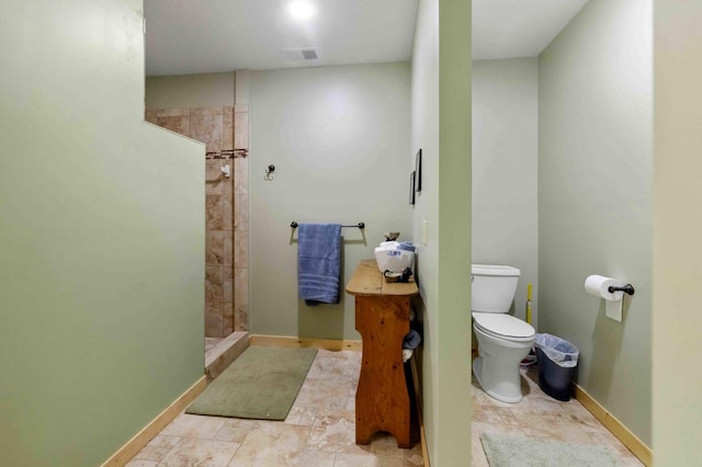 31172 Apache Cir, Breezy Point, MN 56472 - full bathroom with toilet, tiled shower, and baseboards