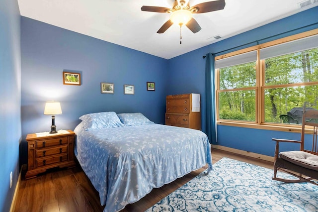 31172 Apache Cir, Breezy Point, MN 56472 - bedroom featuring wood finished floors, lofted ceiling, baseboards, and ceiling fan