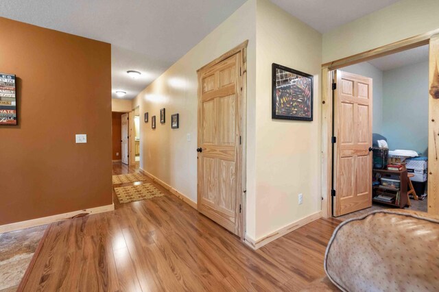 31172 Apache Cir, Breezy Point, MN 56472 - hallway featuring light wood-style floors and baseboards